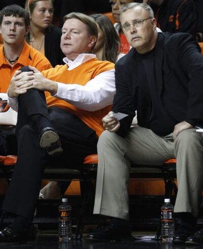 OSU women’s coach Jim Littell, right, took over for Kurt Budke, left, after Budke and assistant coach Miranda Serna were killed in a plane crash Nov. 17, 2011. AP Photo